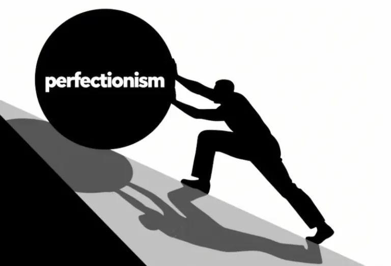 Silhouette of person pushing large 'perfectionism' ball uphill in black and white minimalist style